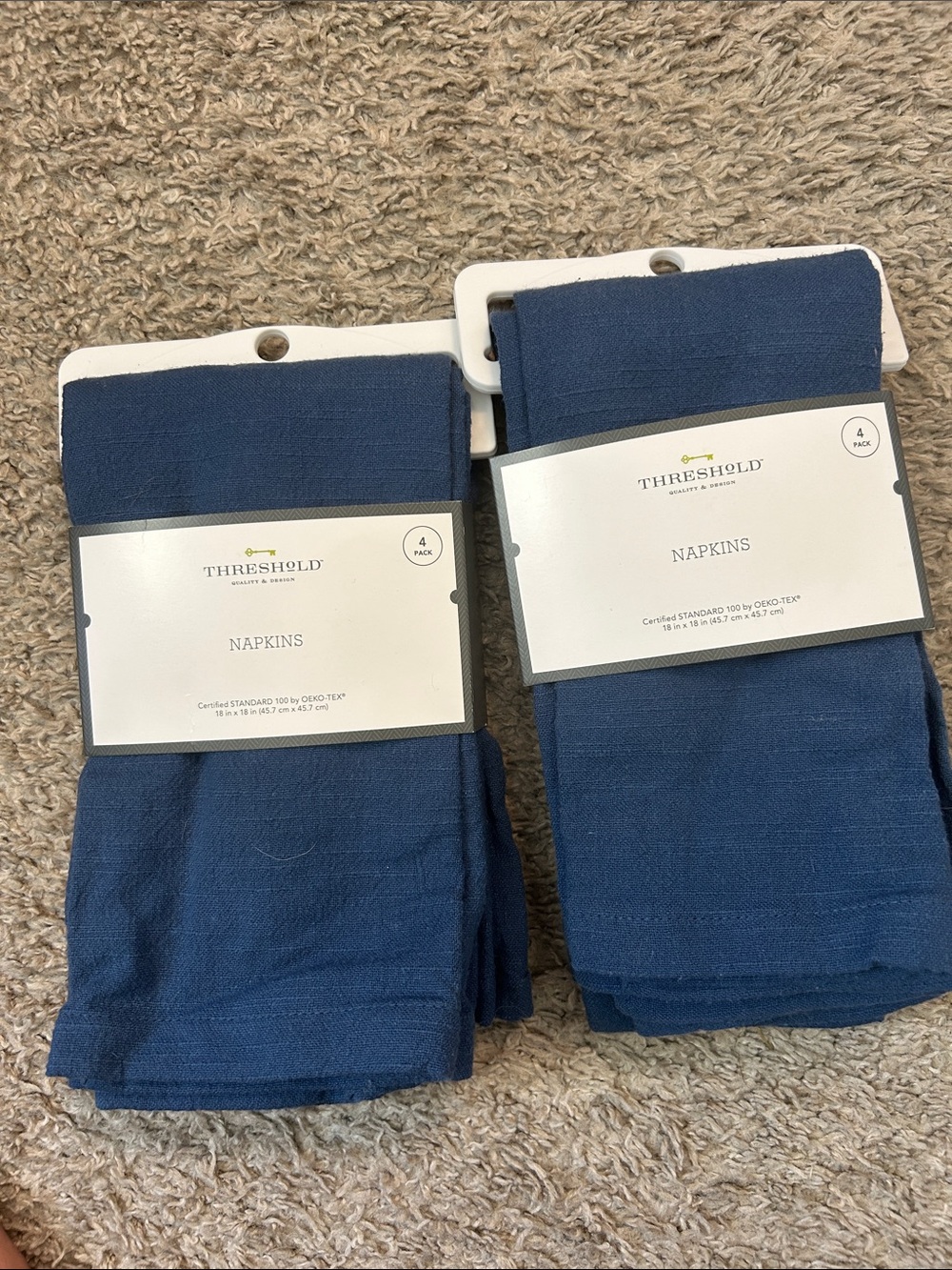 Two 4 pack Threshold cloth napkins navy